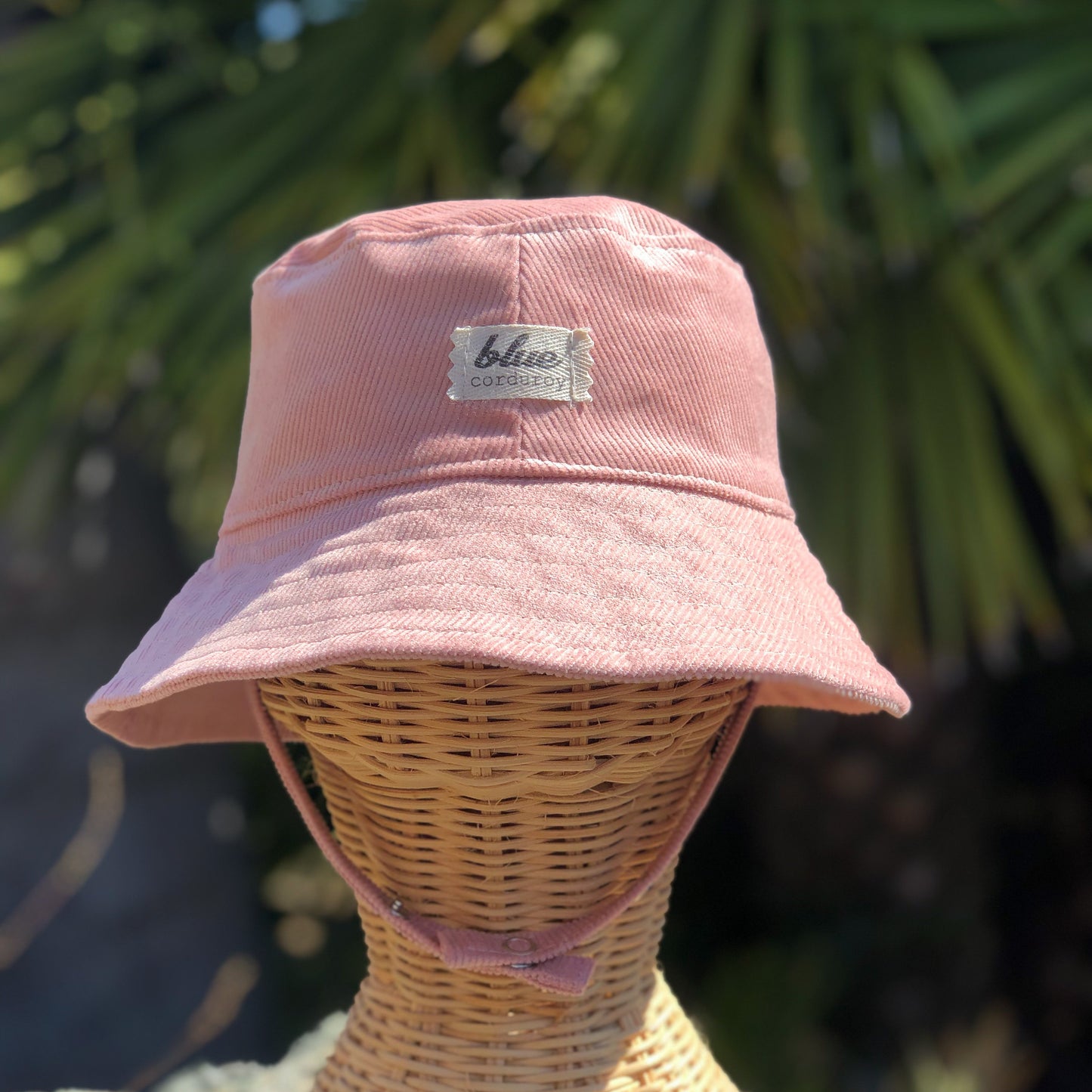 Blush pink corduroy bucket hat for babies