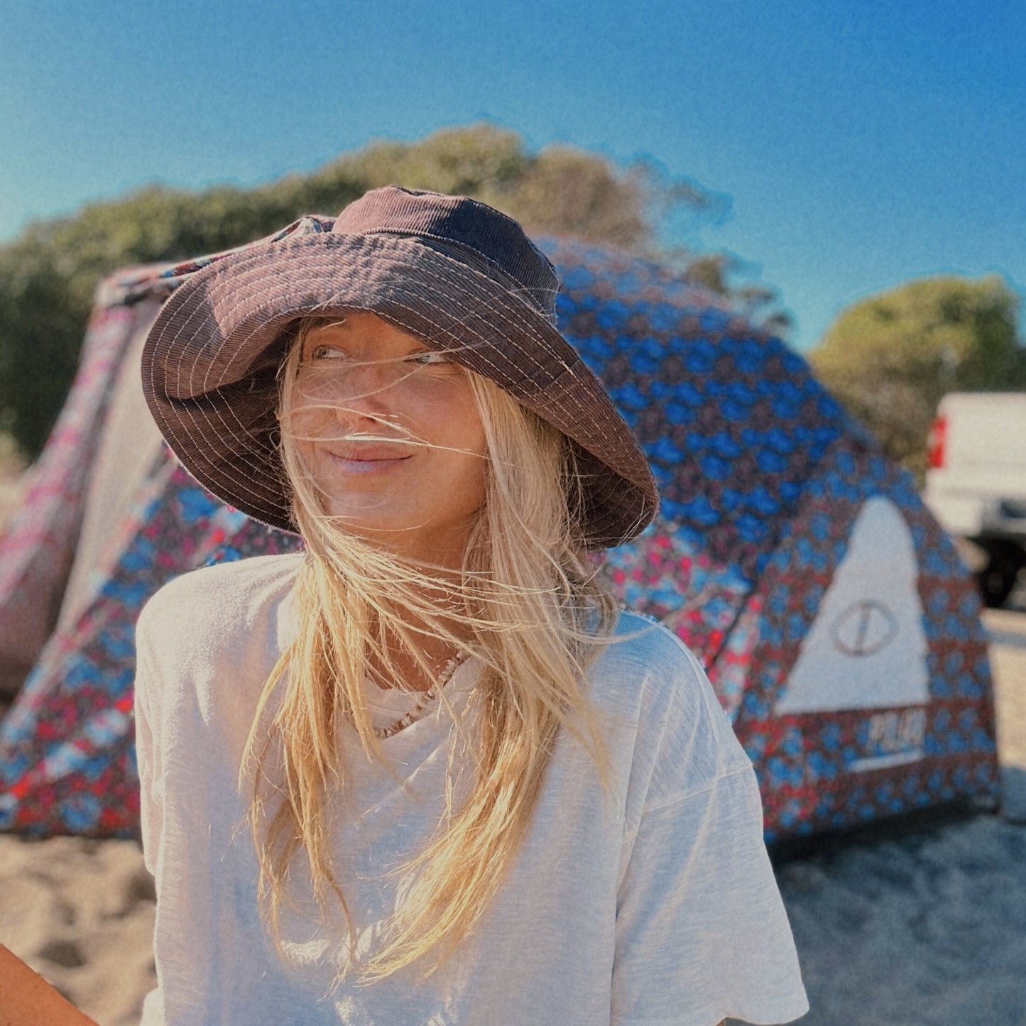 Brown Corduroy Wide Brim Beach Hat on Blonde woman on beach